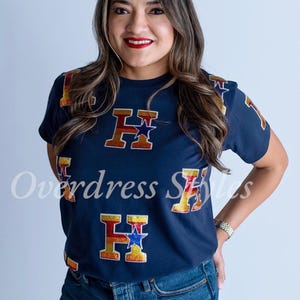 Top con logo Houston Blue Paillettes