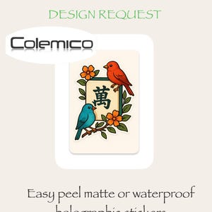 May include: A rectangular sticker featuring a central mahjong tile with the Chinese character 萬, flanked by a red bird and a blue bird perched on leafy branches with orange flowers. The text Colemico appears above the sticker design.