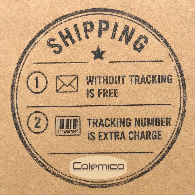 May include: A circular stamp on a cardboard surface with the word "SHIPPING" at the top. Below, it states "WITHOUT TRACKING IS FREE" and "TRACKING NUMBER IS EXTRA CHARGE". The brand name "Colemico" is at the bottom.