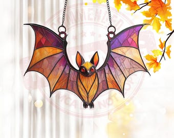 May include: Stained glass bat with outstretched wings, featuring orange, purple, and yellow hues. The bat has red eyes and is suspended by a chain. A decorative piece for Halloween or gothic decor.