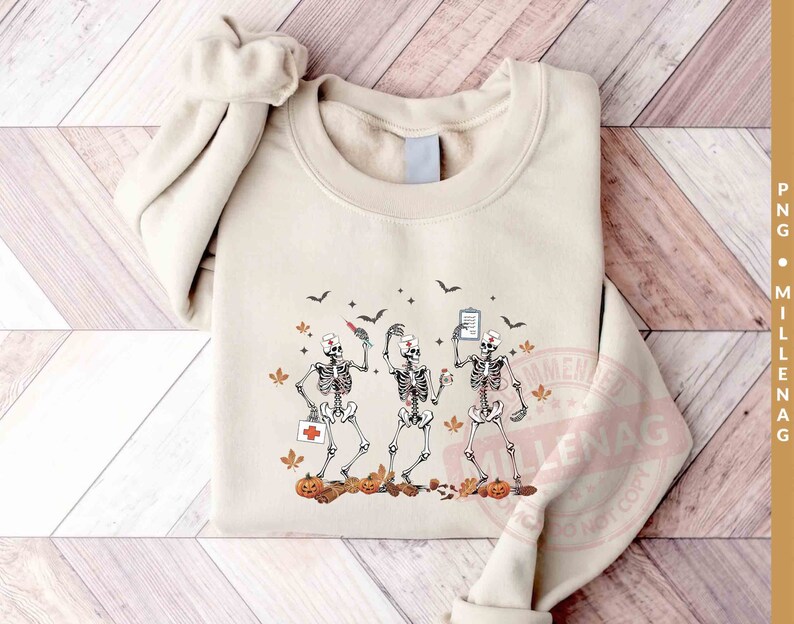 May include: Three skeleton nurses wearing scrubs and hats are holding medical supplies. They are surrounded by fall leaves, pumpkins, and bats. The skeletons are smiling and appear to be happy.