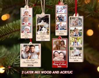 May include: Set of six wooden and acrylic Christmas ornaments with personalized photos and text. Each ornament features a different family photo and a personalized message, such as "Amber first Christmas 2024" and "Best Team Ever 2024".