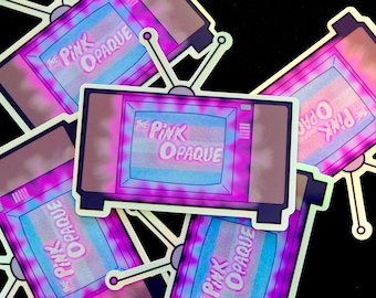 May include: A collection of stickers featuring a retro television design. The TV screens display the text "The Pink Opaque" in a pink and blue color scheme. The stickers have a holographic finish and are set against a black background.