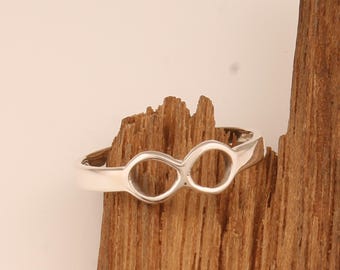 Anello argento con fior di loto e nodo infinito - Tibet Milano