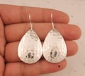 Handmade Hammered Sterling Silver Teardrop Dangle Earrings product logo