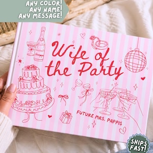 May include: A rectangular book with a light pink and white vertical striped cover. The front features red line art illustrations of a champagne bottle, a tiered cake, rings, a disco ball, and glasses. The text reads Wife of the Party and FUTURE MRS. PAPPIS.