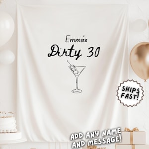 Puede incluir: Un telón de fondo blanco con el texto "Emma's Dirty 30" y una ilustración de copa de martini. La escena incluye globos blancos y dorados, un pastel, regalos y el texto "Add Any Name and Message!"