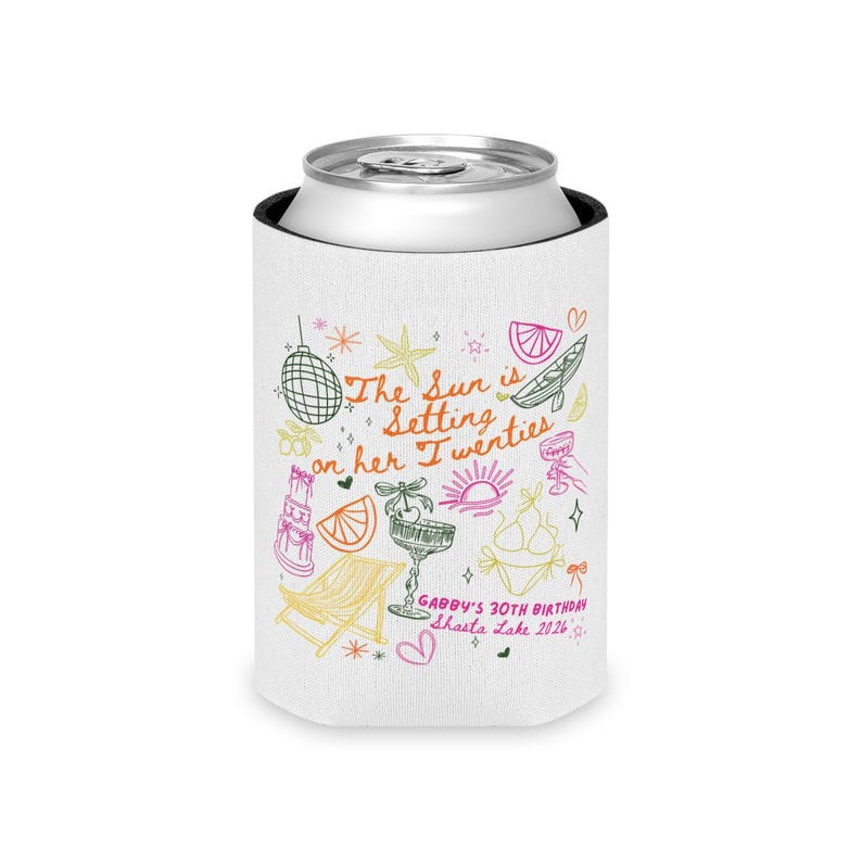 May include: White can cooler with a silver top. The cooler features colorful doodles and text that reads "The Sun is Setting on her Twenties" and "Gabby's 30th Birthday Shasta Lake 2026."
