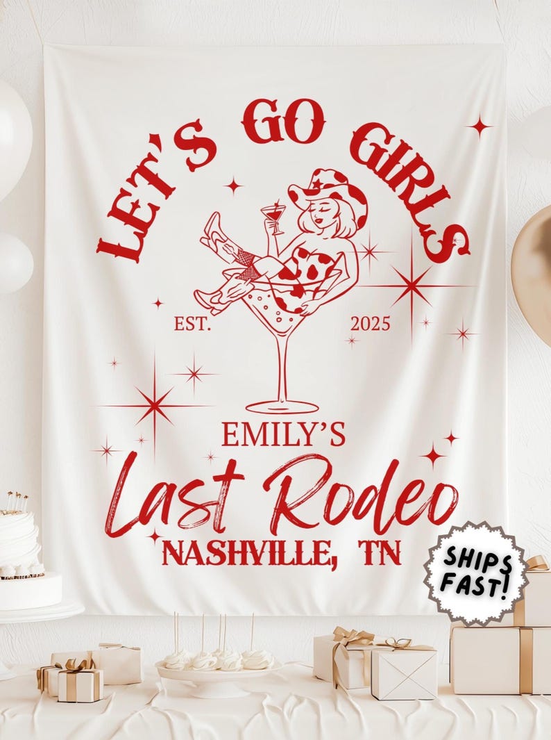 May include: White fabric banner with red text and graphics. The banner reads "LET'S GO GIRLS" and "EMILY'S Last Rodeo NASHVILLE, TN". A cowgirl illustration is in a martini glass. The banner is for a bachelorette party.