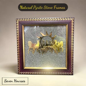 May include: A square wall frame with a dark purple border and gold trim, featuring a textured gray pyrite stone background. Centered is a gold-toned metal cutout of seven horses running in front of a sunburst design. The text Natural Pyrite Stone Frames is visible.