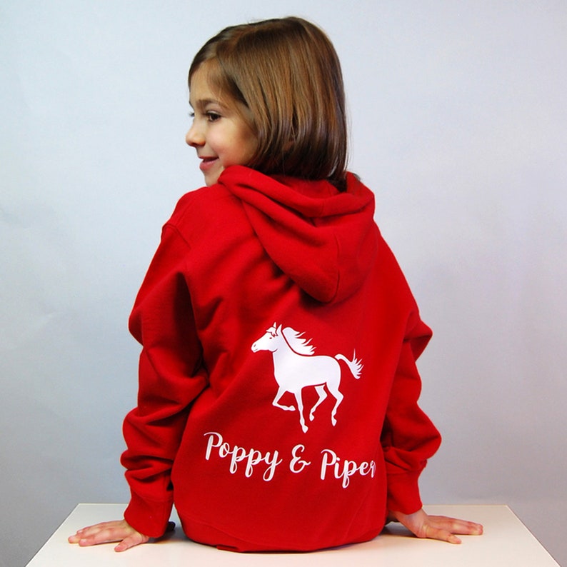 Child hoodie inspired by horse riding the design is of a running horse - your able to personalise this hoodie by entering the child's name and horse name if applicable.