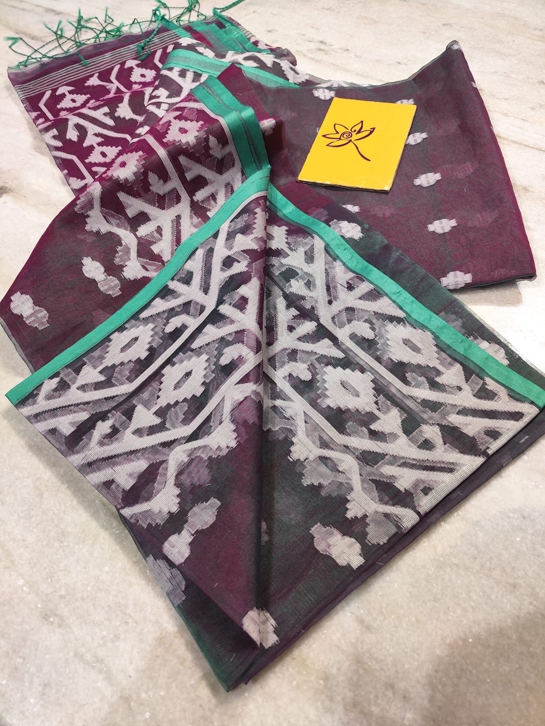 Dark Green Muslin Jamdani Saree with Zari buttis main image 1