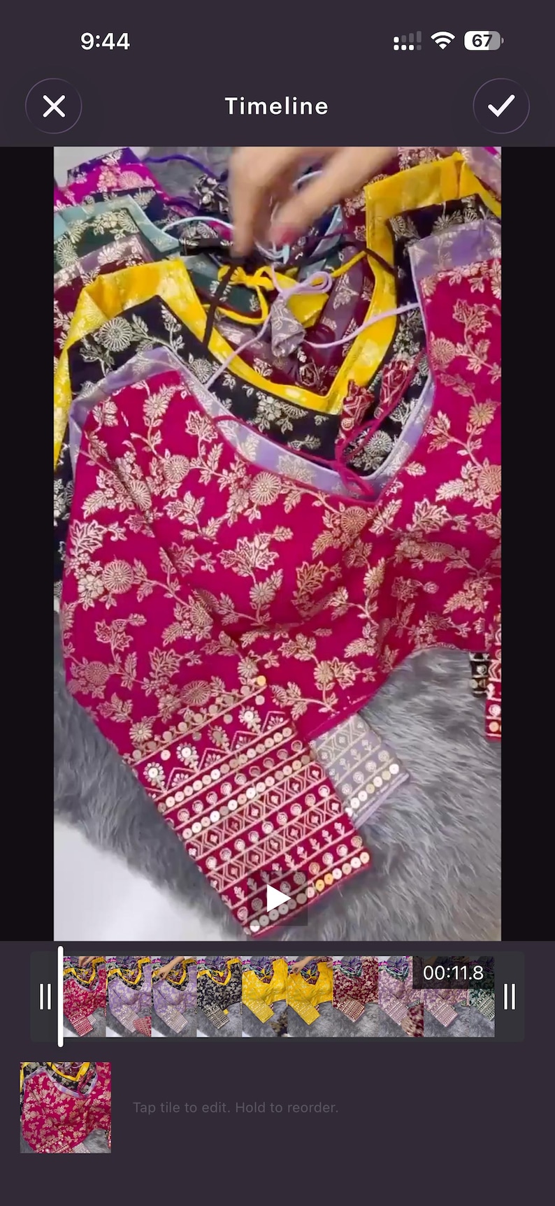 May include: A collection of long-sleeved blouses featuring intricate gold floral embroidery on vibrant fabrics including magenta, black, and yellow. Each blouse has a round neckline and detailed cuffs with geometric patterns and small circular accents.