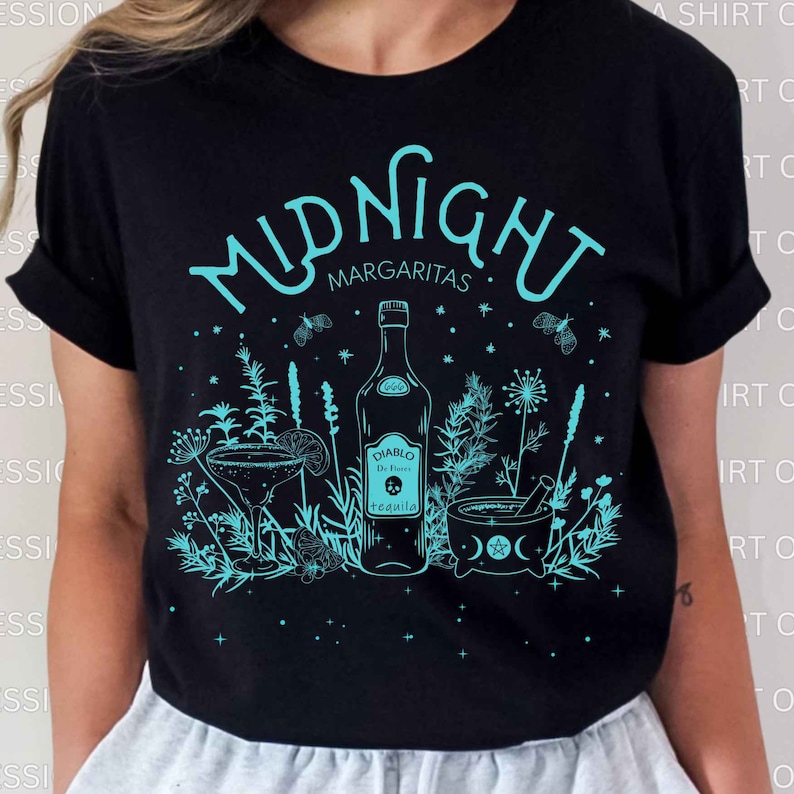 May include: Black t-shirt with a teal blue graphic design of a bottle of tequila, a margarita glass, and a mortar and pestle with a crescent moon and stars. The text "Midnight Margaritas" is above the design.