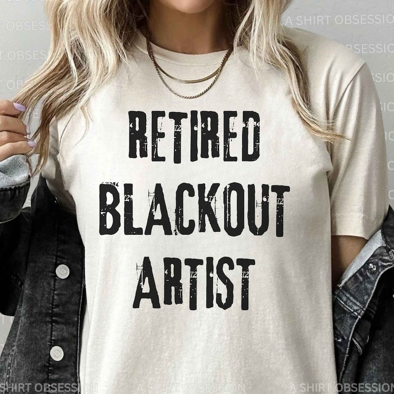 May include: A white t-shirt with the text "Retired Blackout Artist" printed in black with a distressed font.
