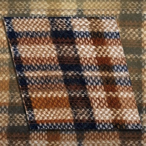 May include: A close-up of a brown, beige, and blue plaid fabric with a fuzzy texture.