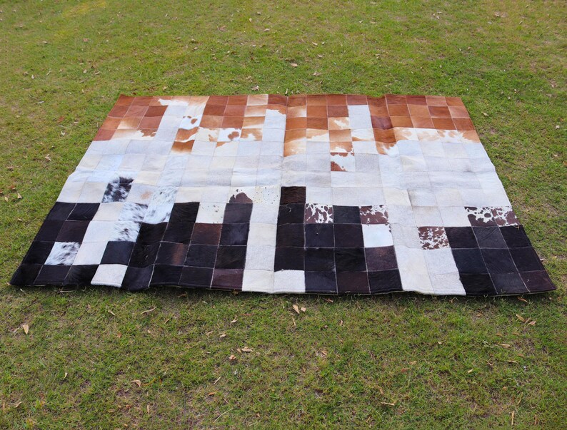 Add rustic elegance with our Cowhide Patchwork Runner. Unique Patchwork Cowhide Rug Decor, Handmade in Custom Size. Perfect Cowhide Area Rug for Living Room & beautiful Home Decor Rugs. Natural, durable statement piece.