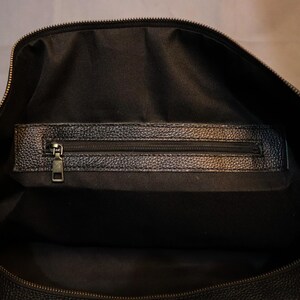 Personalized Large Cowhide Duffel Bag made from genuine hair-on leather. This unisex, handmade travel bag is perfect for weekend getaways or daily use. Spacious and stylish with multiple compartments, it offers both function and flair. The adjustable strap adds comfort, while real cowhide ensures each bag is unique. A thoughtful gift for him or her. Note: Natural cowhide patterns vary, making every piece one-of-a-kind.