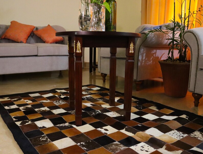 Add rustic elegance with our Cowhide Patchwork Runner. Unique Patchwork Cowhide Rug Decor, Handmade in Custom Size. Perfect Cowhide Area Rug for Living Room & beautiful Home Decor Rugs. Natural, durable statement piece.