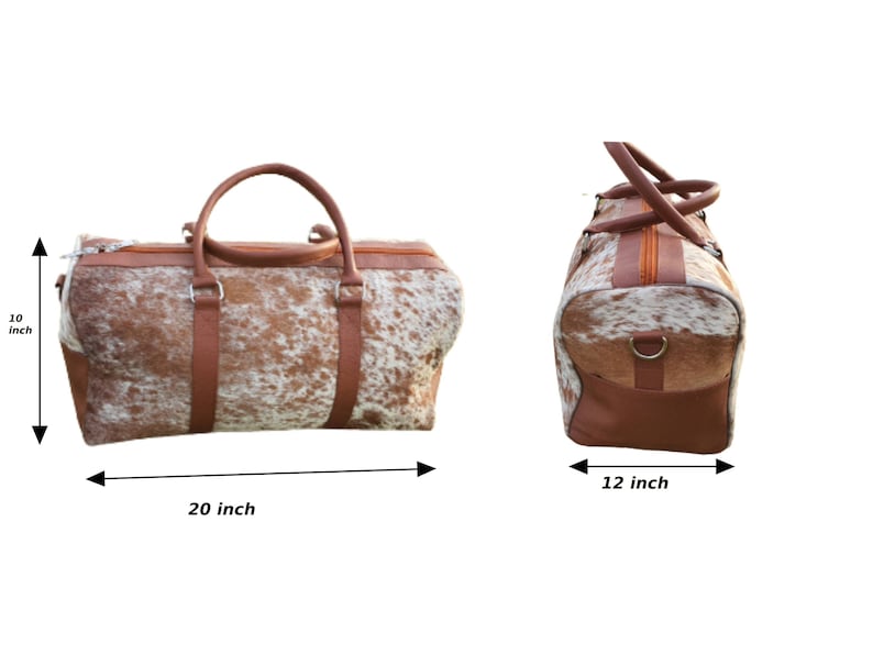 K&ouml;nnte beinhalten: Eine braune und wei&szlig;e Reisetasche aus Kuhfell mit braunen Lederverzierungen. Die Tasche ist 50,8 cm breit, 30,5 cm hoch und 25,4 cm tief.
