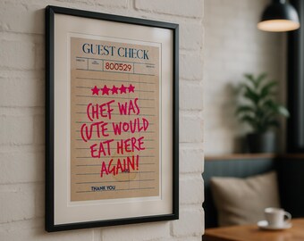 May include: A framed print featuring a guest check design. The check has five stars and the text "Chef was cute would eat here again!" written in pink. The text "Guest Check" and "Thank You" are also visible.