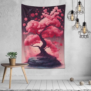 May include: A pink and purple tapestry featuring a stylised tree with pink blossoms and a dark purple background. The tree is on a small island with rocks and water.