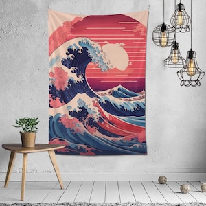May include: A tapestry depicting a large blue wave crashing against a pink and red sunset. The wave is shown in a traditional Japanese style, with white foam and a swirling pattern.