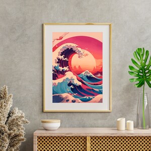 May include: A framed print of a colorful wave with a red, orange, and pink sunset in the background. The wave is blue, green, and purple. The print is in a wooden frame.