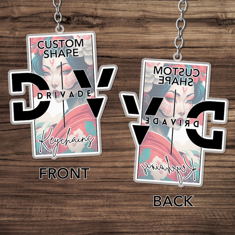 May include: A black and white keychain with a custom shape design. The keychain features a woman with a red and white kimono and the text "CUSTOM SHAPE" and "DRIVADE Keychains".