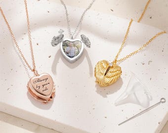 May include: Three heart-shaped locket necklaces in rose gold, silver, and gold. The rose gold locket has the inscription "Always by your side." The silver locket opens to reveal a photo. The gold locket has wing details and a small funnel and pin.