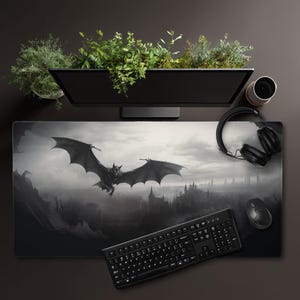 May include: A white ceramic mug with a black handle and the text "But First, Coffee" in a handwritten style. The mug is on a white surface. The mug is approximately 4 inches tall.