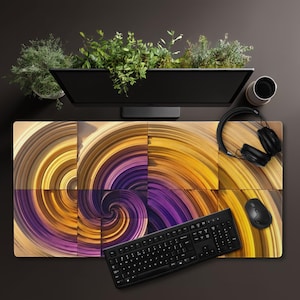 May include: A desk setup featuring a large, colorful mousepad with a swirling design in shades of gold, purple, and brown. A black keyboard, mouse, and headphones are on the pad. A computer monitor and a planter with greenery are also visible.