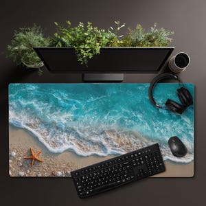May include: A white ceramic mug with a black handle and the text "But First, Coffee" in a bold, black font. The mug is set against a blurred background, suggesting a cozy setting.