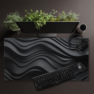 May include: A white ceramic mug with a black handle and the text "But First, Coffee" in a black, bold font. The mug is sitting on a wooden surface. The mug is approximately 4 inches tall.