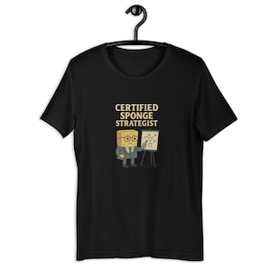 Certified Sponge Strategist T-Shirt – Funny Cartoon Management Tee, Absurd Office Humor Shirt, Business Parody Gift