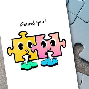 かわいいラブカード、パズルジグソーパズルのキャラクターがお互いを見つけ、ついに完成、ハート型のパズル。安っぽい、StudioShine によるデザイン