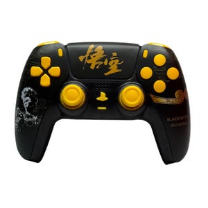 May include: Black and gold PlayStation 5 controller with a stylized image of a monkey and the text "Black Myth Wu Kong".
