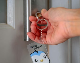 Llavero con estampado de pingüino regordete de una sola cara