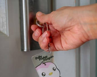 Llavero con estampado de pingüino regordete de Polly