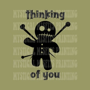 May include: Black and white illustration of a voodoo doll with needles sticking out of it. The text "Thinking of you" is written above the doll.