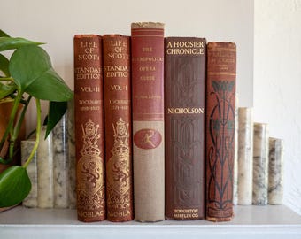 Lote de libros antiguos en rojo y dorado: libros antiguos muy bonitos