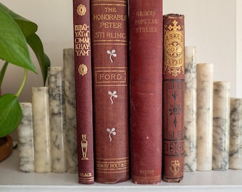 Lote de libros antiguos en rojo y dorado: libros antiguos muy bonitos