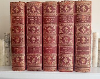 Las obras de Henry Fielding / Libros de cuero rojo y dorado