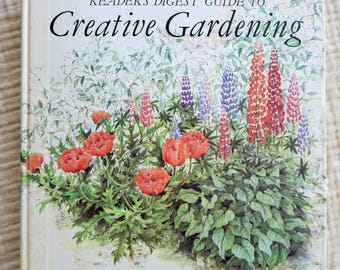 Guía de jardinería creativa de Reader's Digest: ilustraciones de flores a color.