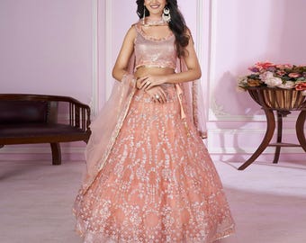 Conjunto de lehenga de red rosa empolvado con dupatta y falda acampanada con lentejuelas y zari / Traje de boda nupcial indio