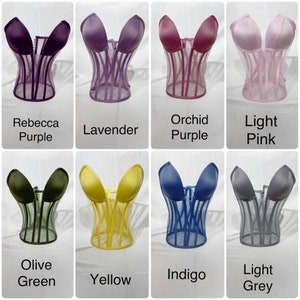 May include: Six different colored mesh corset tops. The colors are Rebecca Purple, Lavender, Orchid Purple, Light Pink, Olive Green, Yellow, Indigo, and Light Grey.