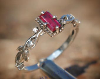 Anillo de rubí en plata de ley oxidada: diseño de rama inspirado en la naturaleza