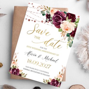 May include: Save the date card with burgundy and blush floral design. The card features gold text that reads "Save the Date" for the 25th wedding anniversary of Alicia & Michael. The date is 18.09.2027. The location is San Francisco, California. Formal invitation to follow.