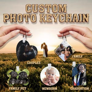 May include: Custom photo keychains in various shapes, including heart, diamond, and circular designs. Each keychain features a personalized photo, with examples showcasing couples, families, family pets, newborns, and graduation themes. The keychains are held against a backdrop of a field at sunset.