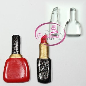 May include: Two miniature bottles of nail polish, one red and one black with glitter, next to two metal cookie cutters shaped like nail polish bottles. The cookie cutters are for making fondant or cookie decorations.